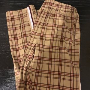 Plaid, drawstring pants with zipper and pockets.